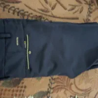 مقداری شلوار در حد نو بسیار خوب و یک کت