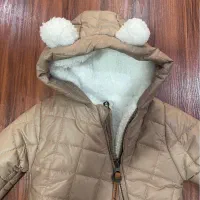 کاپشن سرهمی اورال باسلی مامی لند