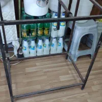 تعدادی وسایل ساندویچی|کولر آبی|رباط‌کریم, رباط‌کریم|دیوار