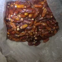 خرما مخصوص حلوا وچنگال داخل پلاستیک