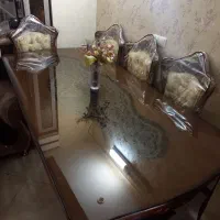میز،ناهار خوری شیک ۸ نفره و دارای شیشه ذخیم