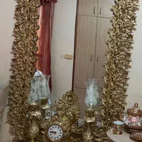 آینه و شمعدون.بوفه.ساعت.میز تلفن