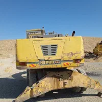 بیل مکانیکی HE100