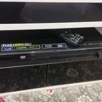 یک عدد دستگاه دی وی دی ال جی با با دو عدد باند