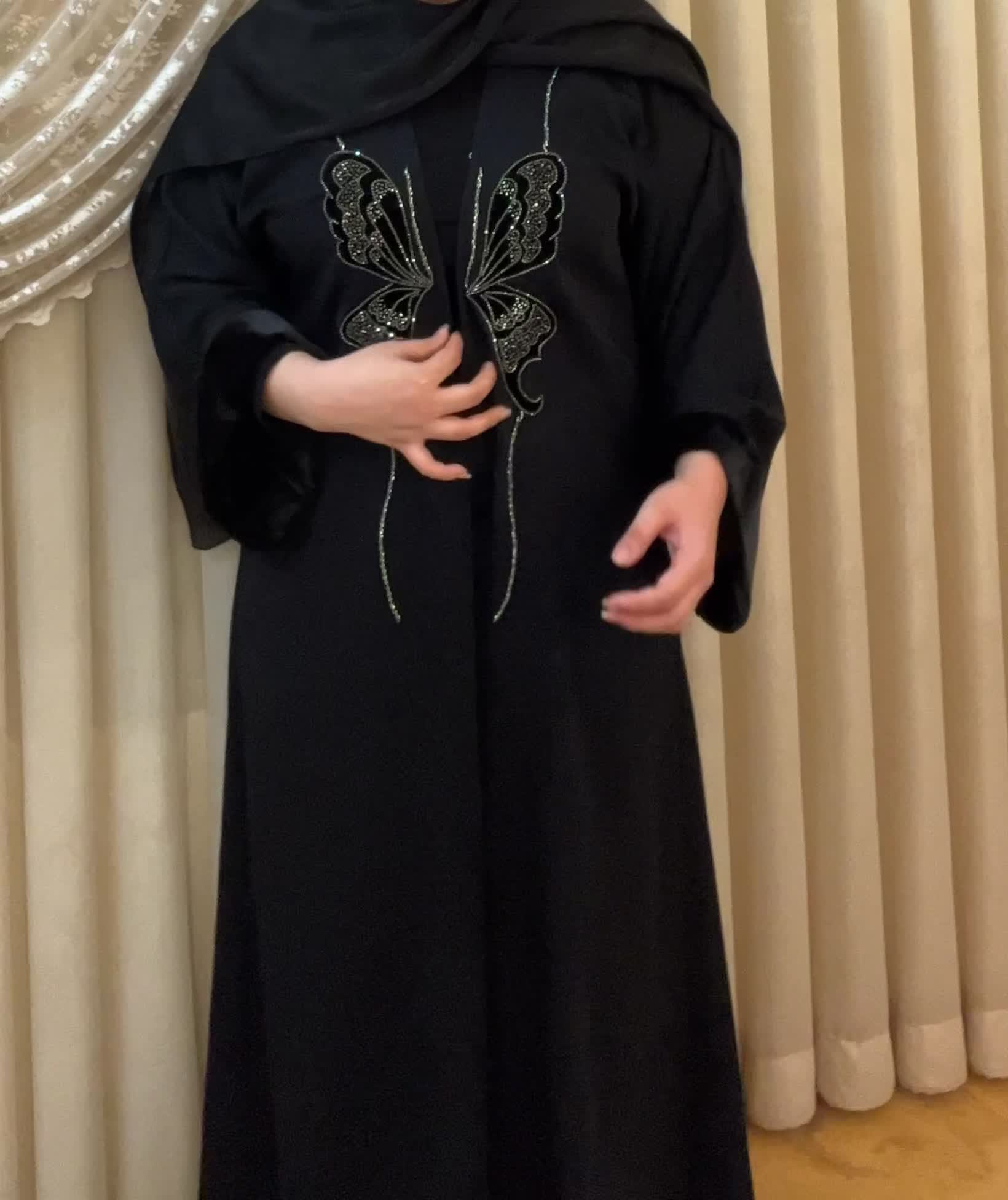 عبای مجلسی|لباس|قم, باجک یک|دیوار