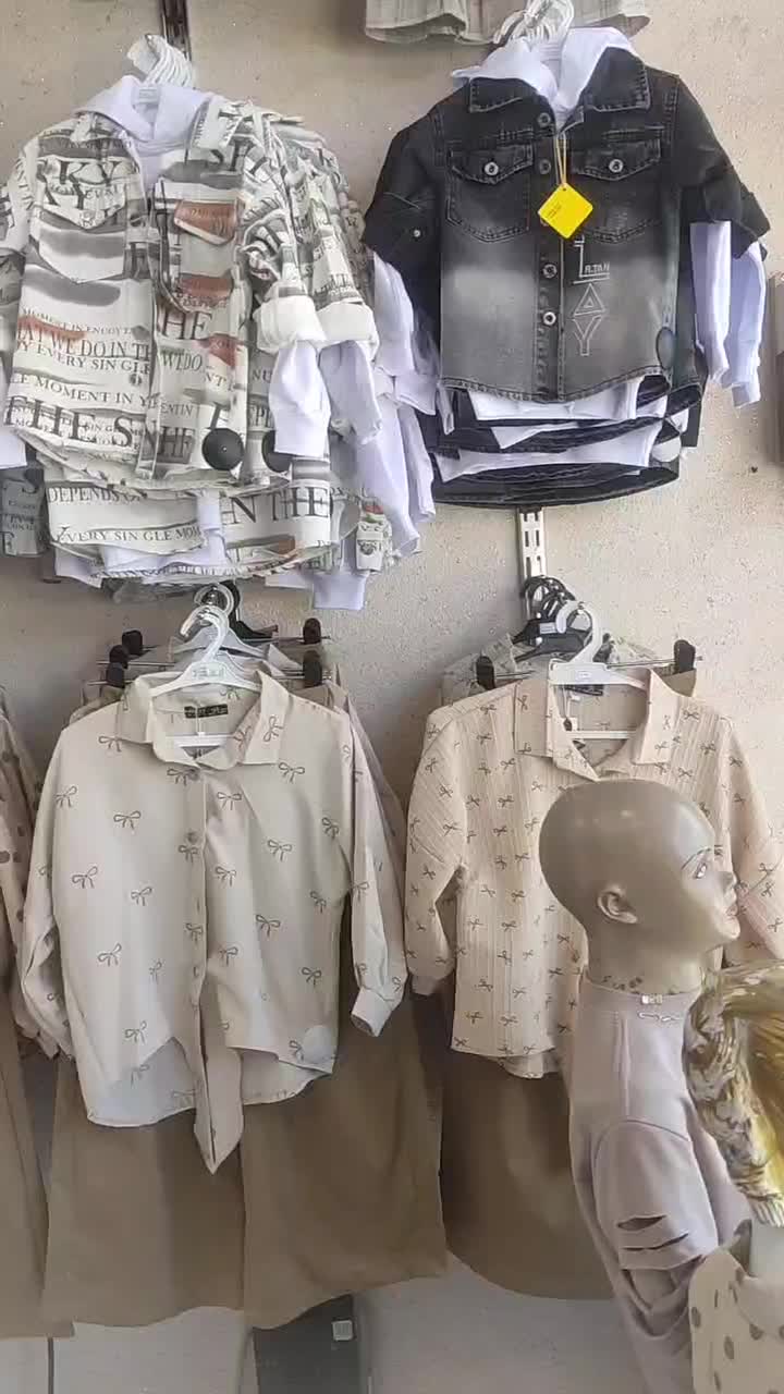 لباس بچه|کفش و لباس بچه|قم, زاویه|دیوار