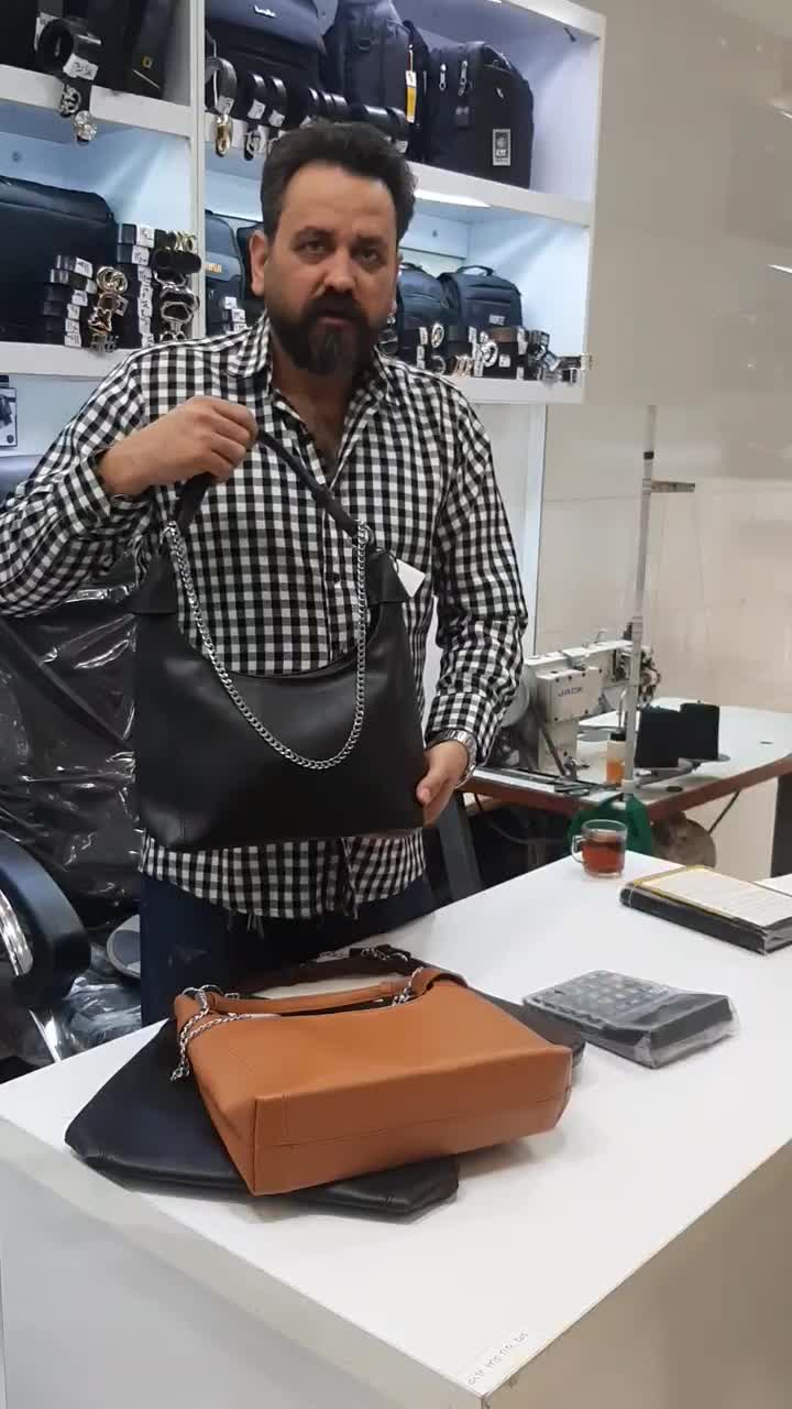 کیف شل زنجیردار|کیف، کفش، کمربند|قم, نیروگاه|دیوار